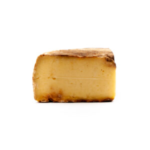 Aged alpine cheese "Toma Bianco" from Piedmont